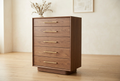 AI-generated concept of a high-end walnut five-drawer tall dresser with brass accents